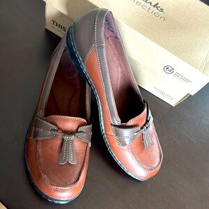 BRAND NEW pair of women’s Size 10 shoes. Very comfortable.